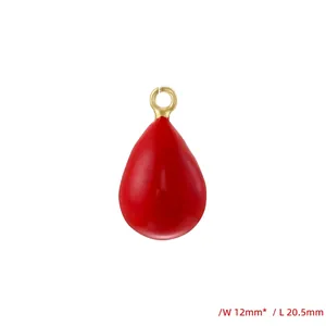 Detailed view of red teardrop charm with gold loop measuring 12mm width and 20.5mm length