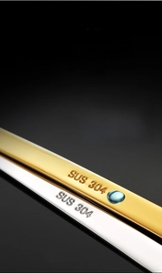 Detailed macro view showing the high-quality SUS 304 stainless steel stamp on metal spoons