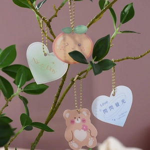 Cute acrylic gift tags with cartoon bear and heart designs on golden bead chains