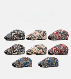 Flat lay of vintage newsboy caps featuring various ethnic geometric patterns and textures