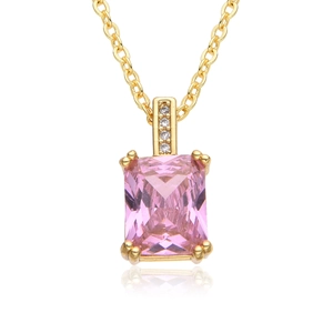 Detailed macro shot of rectangular pink gemstone pendant with gold chain and white zircons