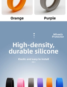 Close-up of durable silicone luggage wheel covers in various colors for noise reduction