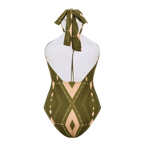 Detailed back view of halter neck swimsuit with geometric green patterns and open back design