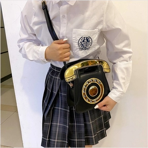 Creative retro telephone-shaped black PU leather crossbody bag with gold dial detail