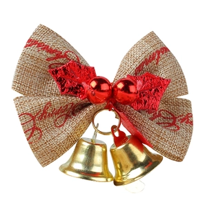Christmas burlap bow ornament with red Merry Christmas print and golden metal bells