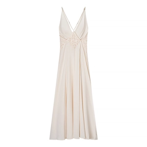 Elegant champagne satin maxi dress with deep V-neck and lace cutout detail for summer