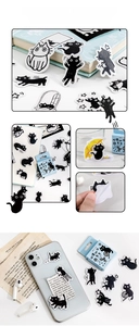 Vista dettagliata di adesivi di gatti in bianco e nero per decorare telefoni e agende