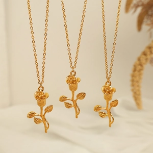 Elegant gold-tone rose pendant necklaces in titanium steel with delicate link chains