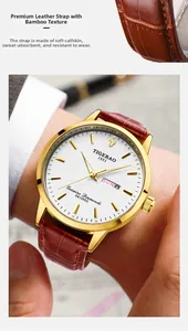 Detail of men's watch with brown leather strap, gold steel case and calendar window