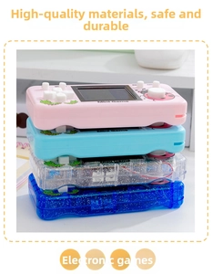 Stack of mini nostalgic handheld Tetris game consoles in pink, blue, and transparent glitter