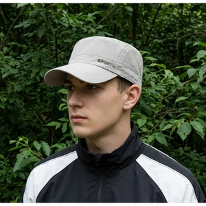 Detail of light gray outdoor sports flat top cap with breathable holes and embroidery