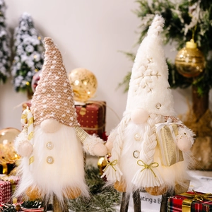Charming LED Christmas gnomes set with plush hats, candy cane and gift box decor