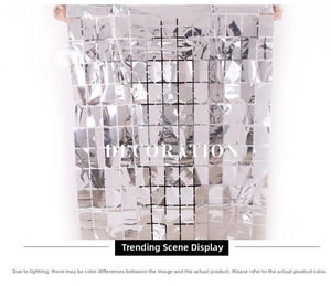 Detailed view of shimmering silver square foil fringe curtain for party backdrops
