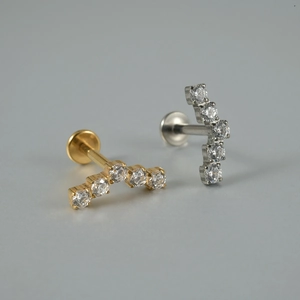 G23 titanium moon-shaped lip stud with arched zircon stones in gold and silver finish