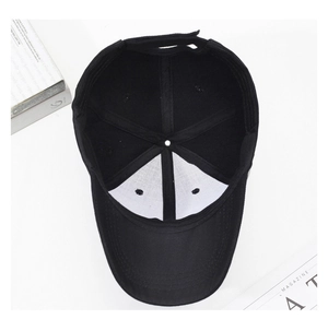 Internal view of a black six-panel baseball cap with adjustable strap and reinforced lining