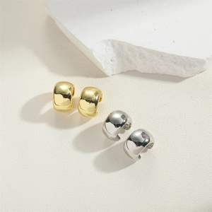 Minimalist French style layered gold and silver wide ear cuff set on white stone