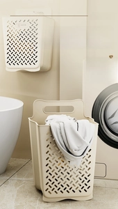 Wall-mounted foldable laundry basket with breathable mesh design in cream white