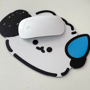 Close-up of minimalist cartoon animal mouse pad with smooth surface and blue drop detail