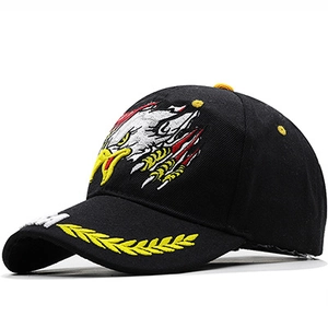 Close-up of bald eagle head and golden laurel embroidery on high-quality navy baseball cap