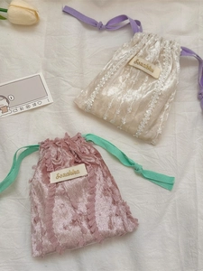 Lace drawstring velvet storage pouch in pink and beige colors for makeup and accessories