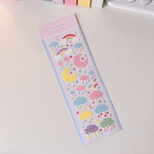 Sparkling pastel stickers with rainbow and cloud designs for decorative journaling