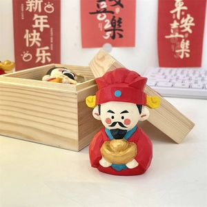 Detailed view of God of Wealth resin figure with red finish and wood gift box