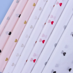 Detail of semi-transparent heart print tissue paper for flower and gift wrapping