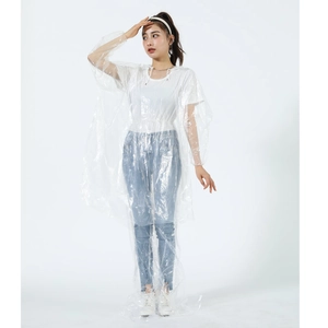 Detail of transparent disposable raincoat with elastic cuffs and waterproof hood material