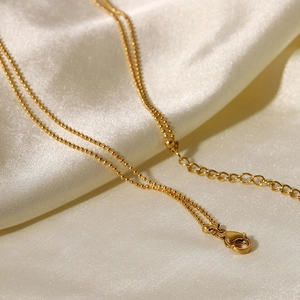 Classic double layer T-bar necklace with golden bead chain and 18K gold lobster clasp