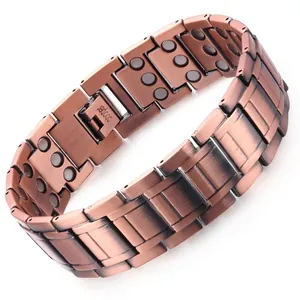Macro detail of red copper magnetic therapy bracelet with brushed finish and inner magnets