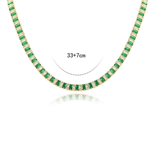 Detailed view of emerald and white cubic zirconia necklace with 33+7cm length marking