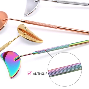 Detail of eyelash mirror handle with anti-slip diamond knurling in multiple metal colors