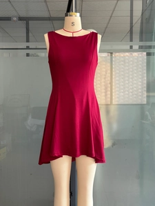 Detailed view of the red sleeveless slim fit dress with a square neckline on a mannequin