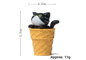 Miniature tuxedo cat figurine in ice cream cone with dimensions 3.5cm by 2.2cm