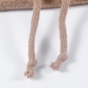 Chic knit slouchy beanie with adjustable knotted drawstrings in warm camel brown