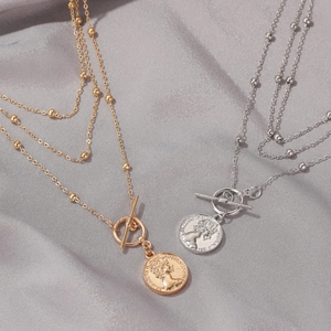 Gold and silver layered coin pendant necklaces with Queen Elizabeth II portrait and OT clasp