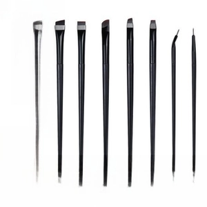 Set of seven professional black makeup brushes for eyeliner, eyebrows and precision shading