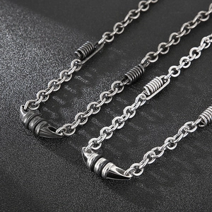 Men's titanium steel O-chain necklace with unique spring coil and cone pendant design