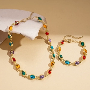 Ethnic style necklace and bracelet set with colorful resin gems on gold chain