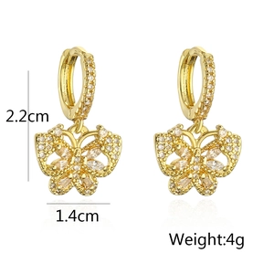 Detail view of gold butterfly earrings with cubic zirconia, size 2.2cm and weight 4g