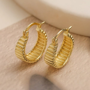 Orecchini a cerchio geometrici placcati in oro con design a spirale strutturata per donna