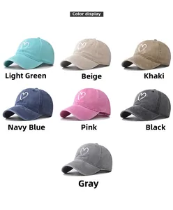 Detailed color display of seven washed cotton baseball caps with embroidered hearts