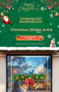 Detail of Merry Christmas window sticker with golden bells and red bows on glass surface