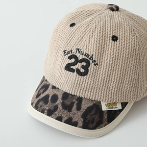 Beige corduroy kids baseball cap with leopard print brim and 23 embroidery detail