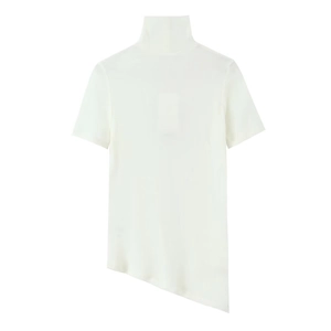 Detail shot of the asymmetric hemline on a white sleeveless knit turtleneck top