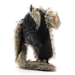 Detail of winter bomber hat with black leather exterior and faux fur lining and ear flaps