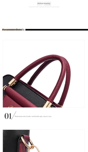 Detail of comfortable round handle and gold hardware on black and burgundy tote bag