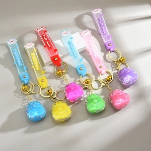 Set of six colorful lucky cat floating liquid keychains with glitter and Fruit bears strap
