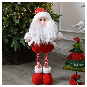 Close-up of plush Santa Claus figure next to a warm glowing Christmas tree with ornaments