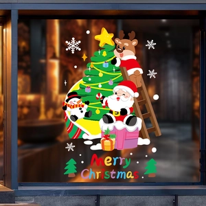 Christmas window decals with Santa Claus and Reindeer for festive glass shop decoration